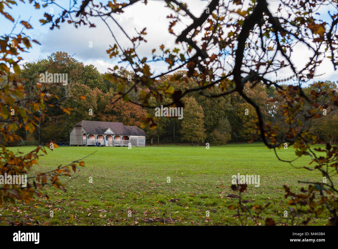 The cricket pitch and pavilion, Sheffield Park, Uckfield, East Sussex, England Stock Photo