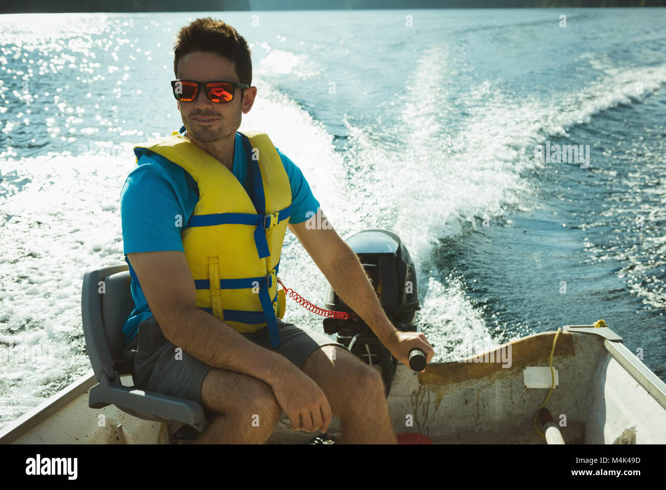 Man travelling on motorboat Stock Photo