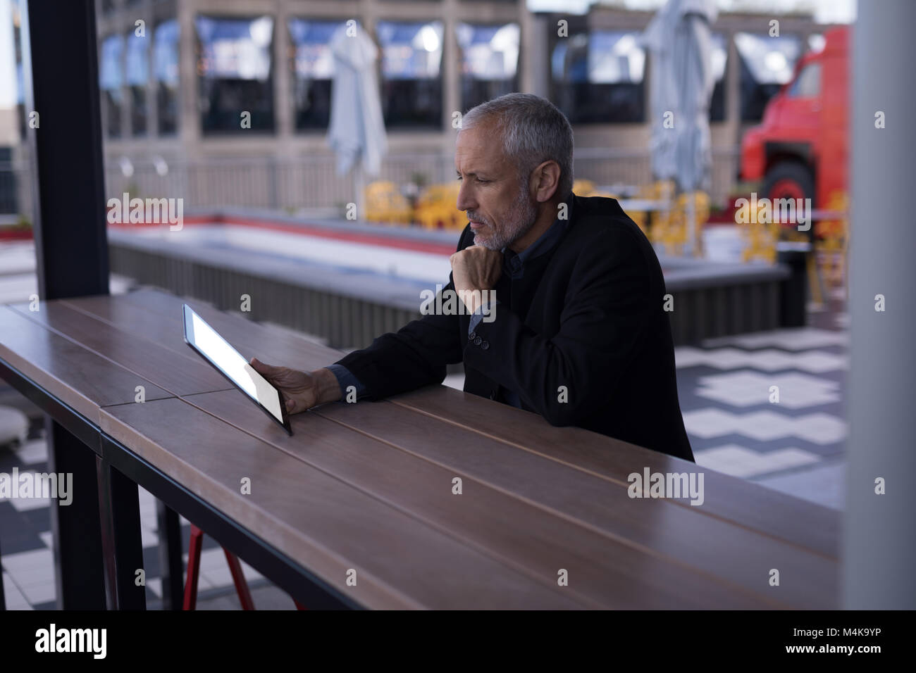 Businessman using digital tablet Stock Photo