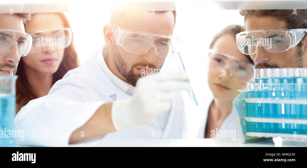 closeup of a group of scientists and pharmacists in the laboratory.the