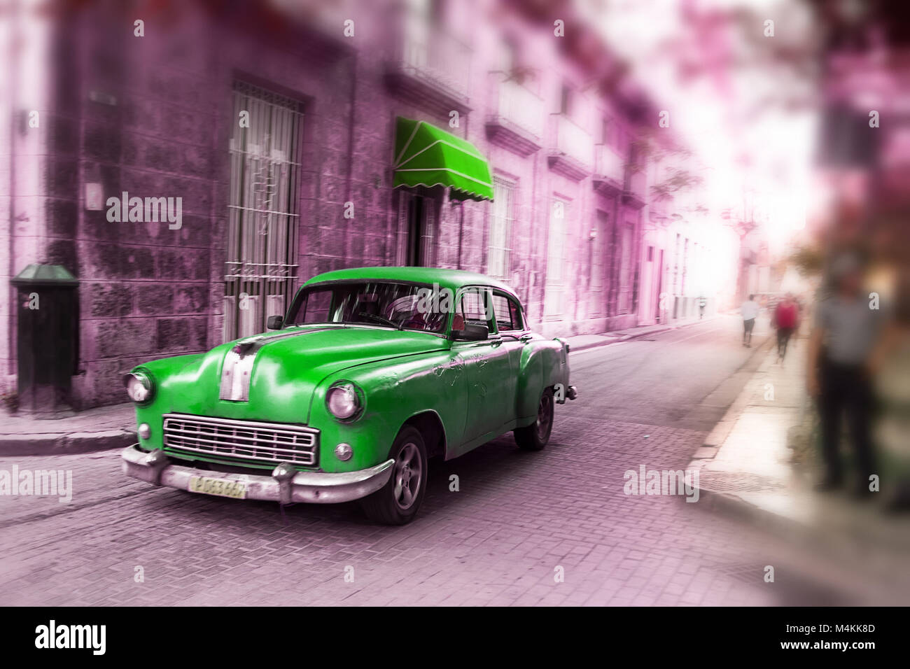 Havana, Cuba - December 3, 2017: Green, old american classical car in road of old Havana (Cuba) Stock Photo