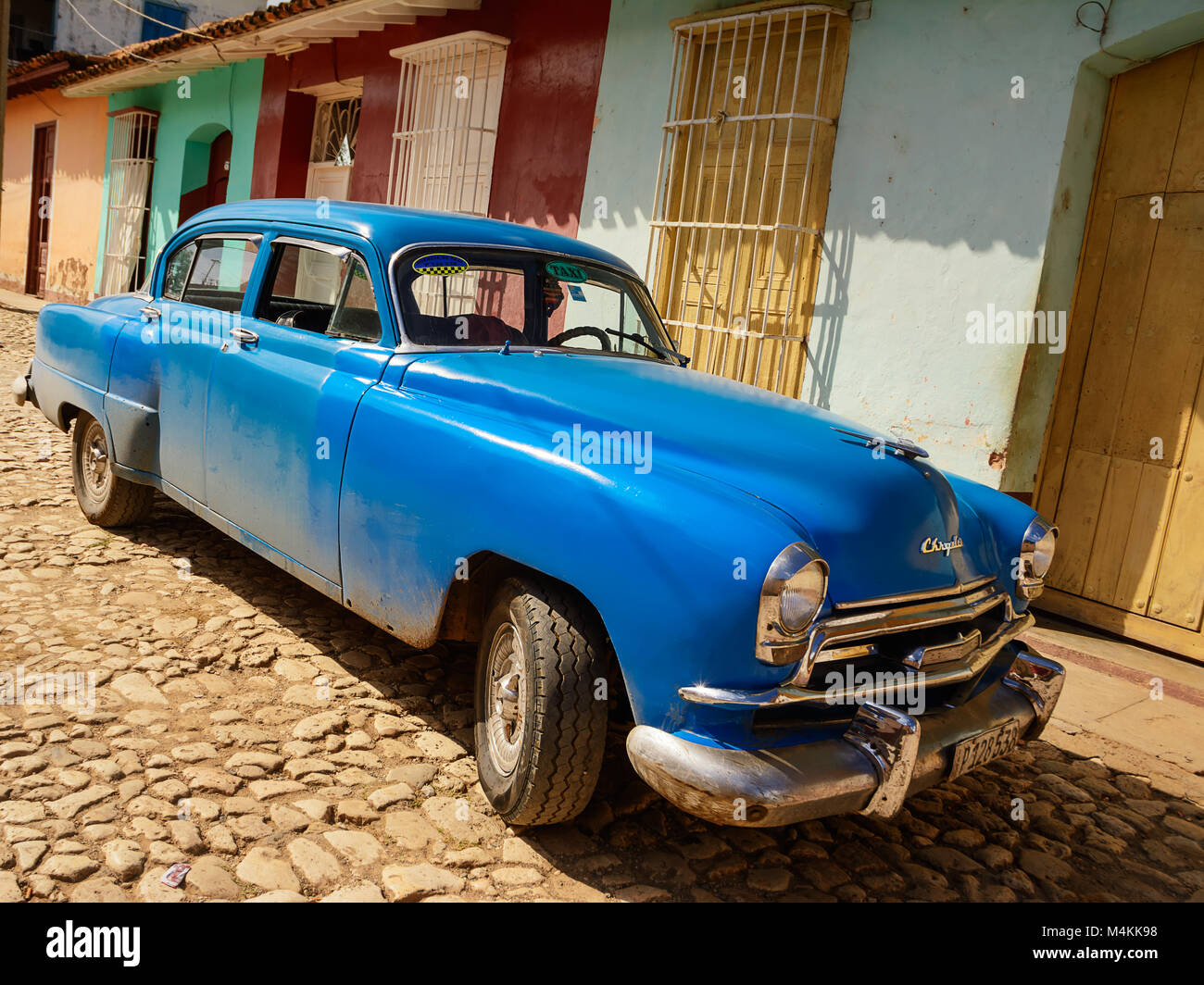 Trinidad, Cuba - December 8, 2017: Old American car parked on the Trinidad street Stock Photo