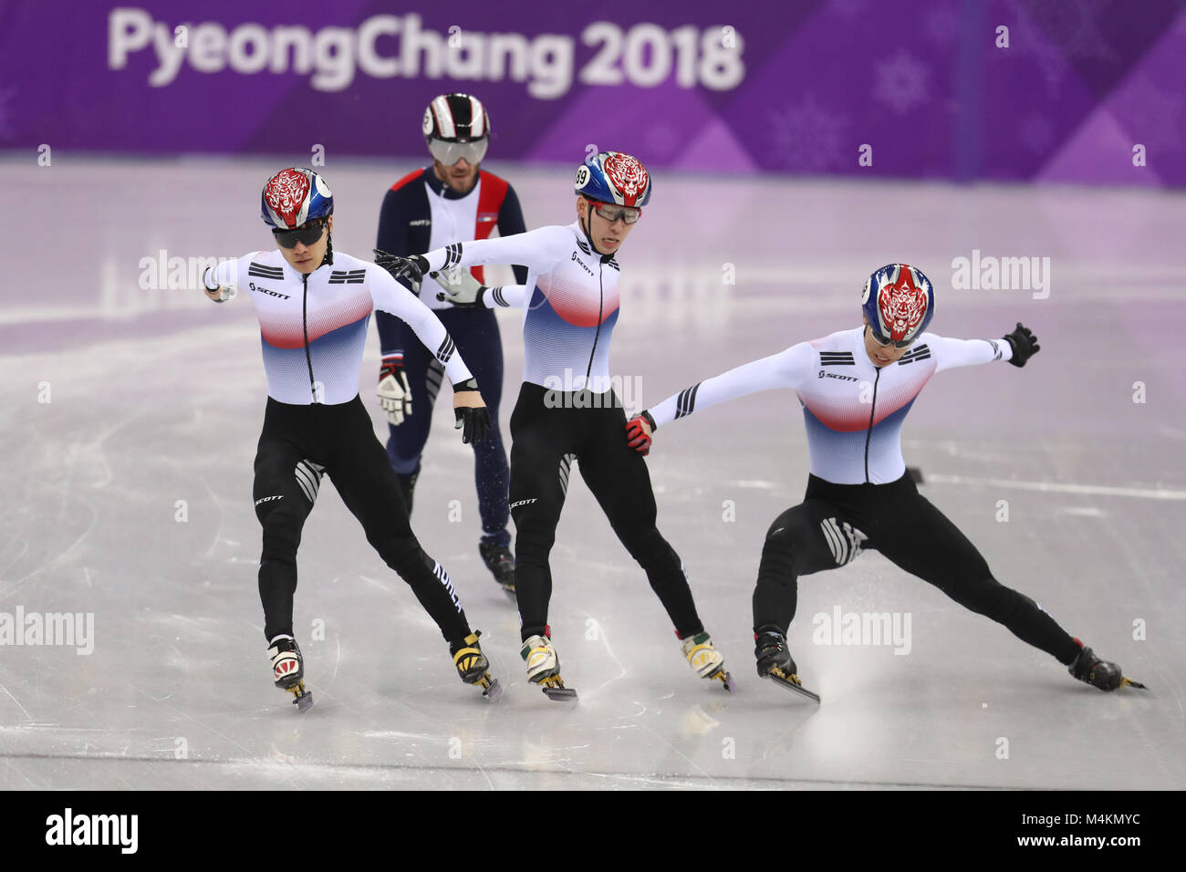 Korea Republic's Seo Yira (left) wins the Short Track Speed Skating