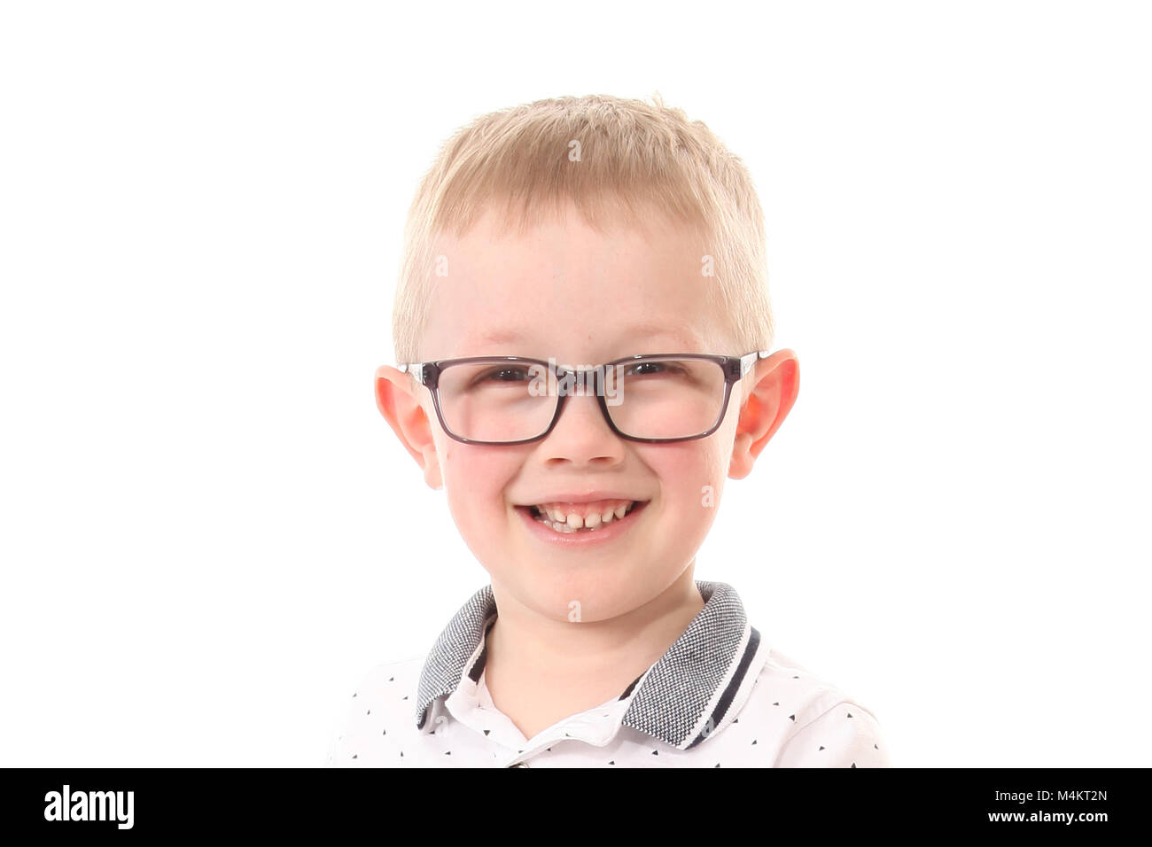 6 year old boy with glasses on Stock Photo