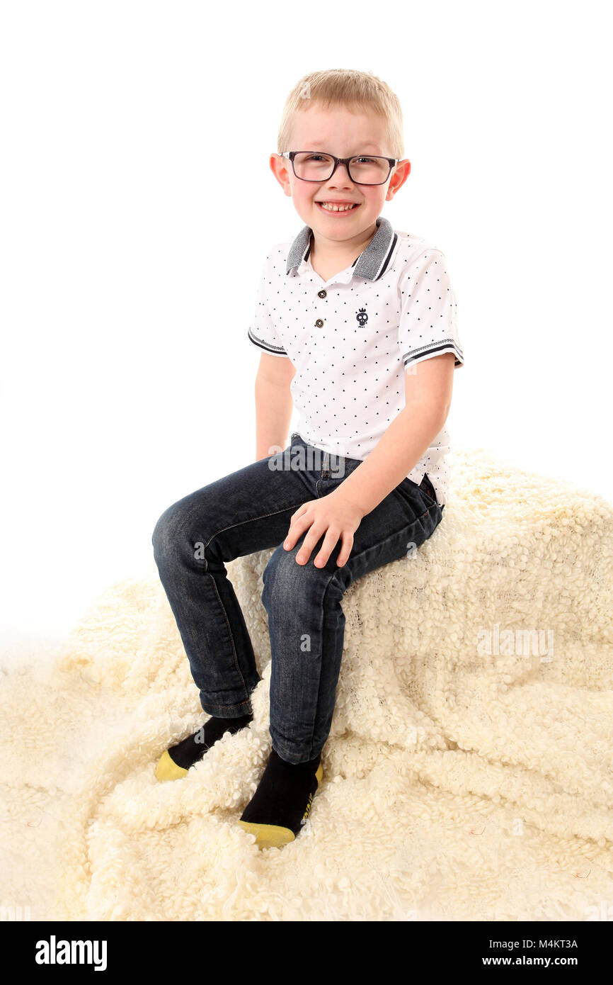 6 year old boy with glasses on Stock Photo