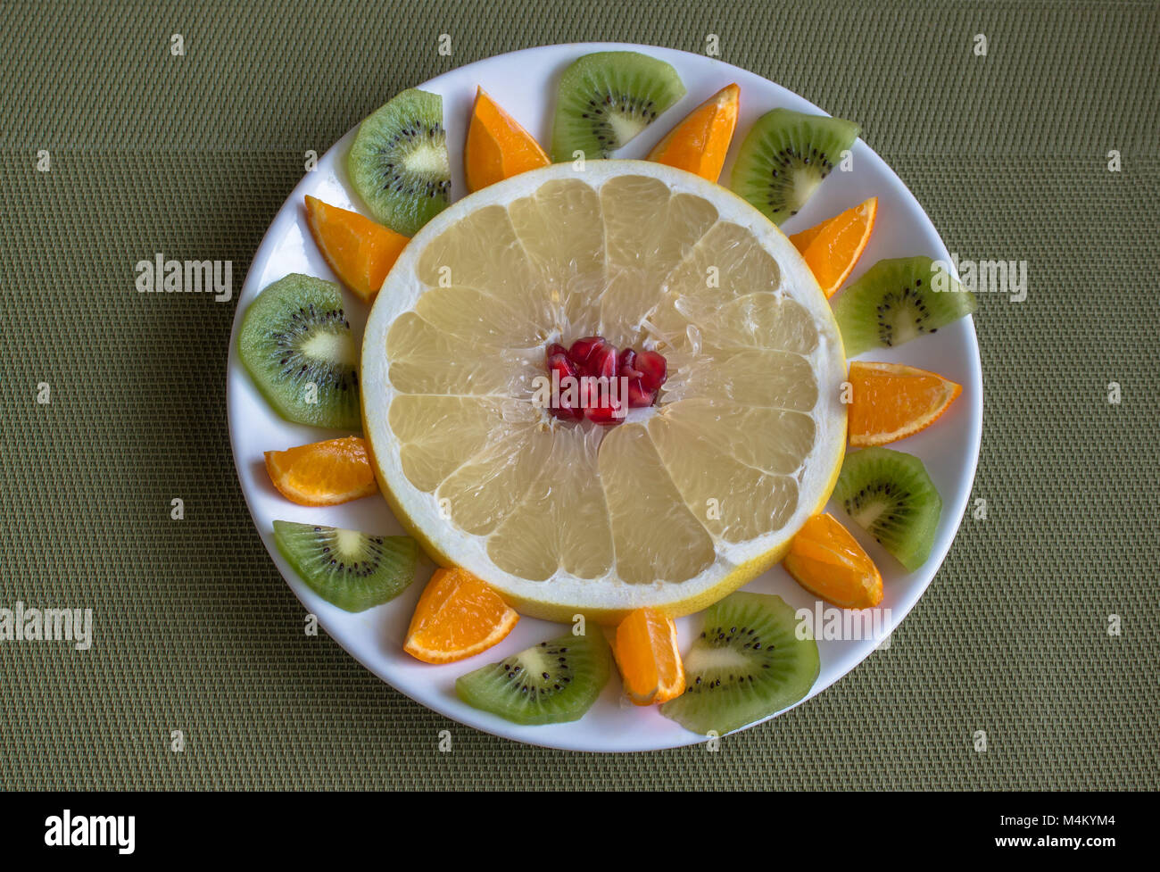 Fruit flower pomelos, kiwi, mandarin and pomegranate Stock Photo Alamy