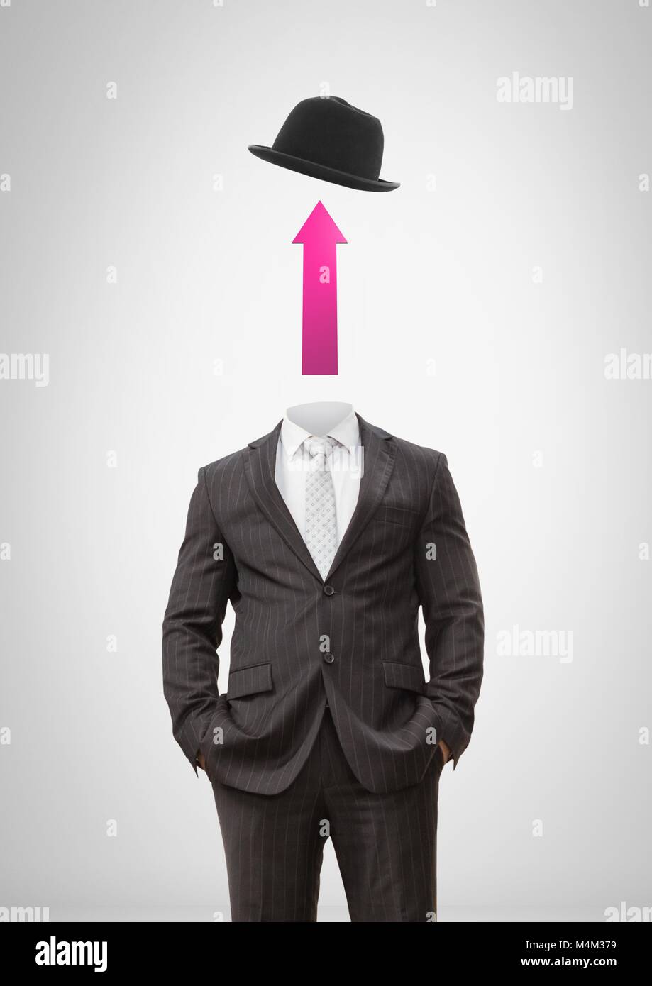 Headless man with surreal floating hat and up arrow Stock Photo - Alamy