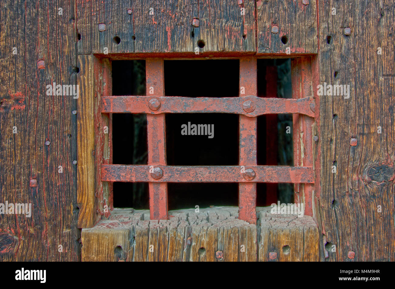 The old jailhouse door in Cimarron, New Mexicois pretty sturdy! Stock Photo