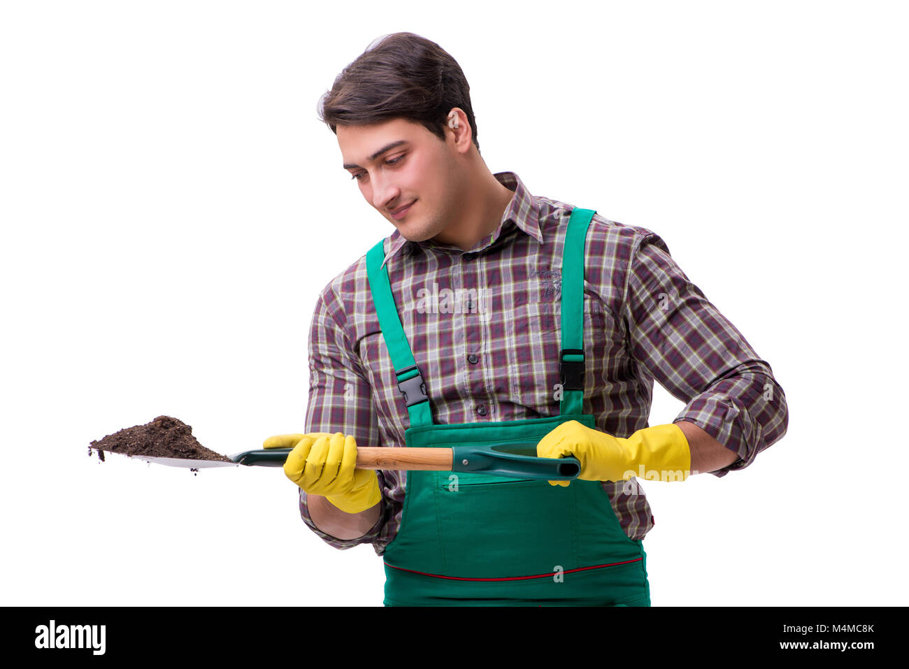 Young man gardener isolated on white Stock Photo - Alamy