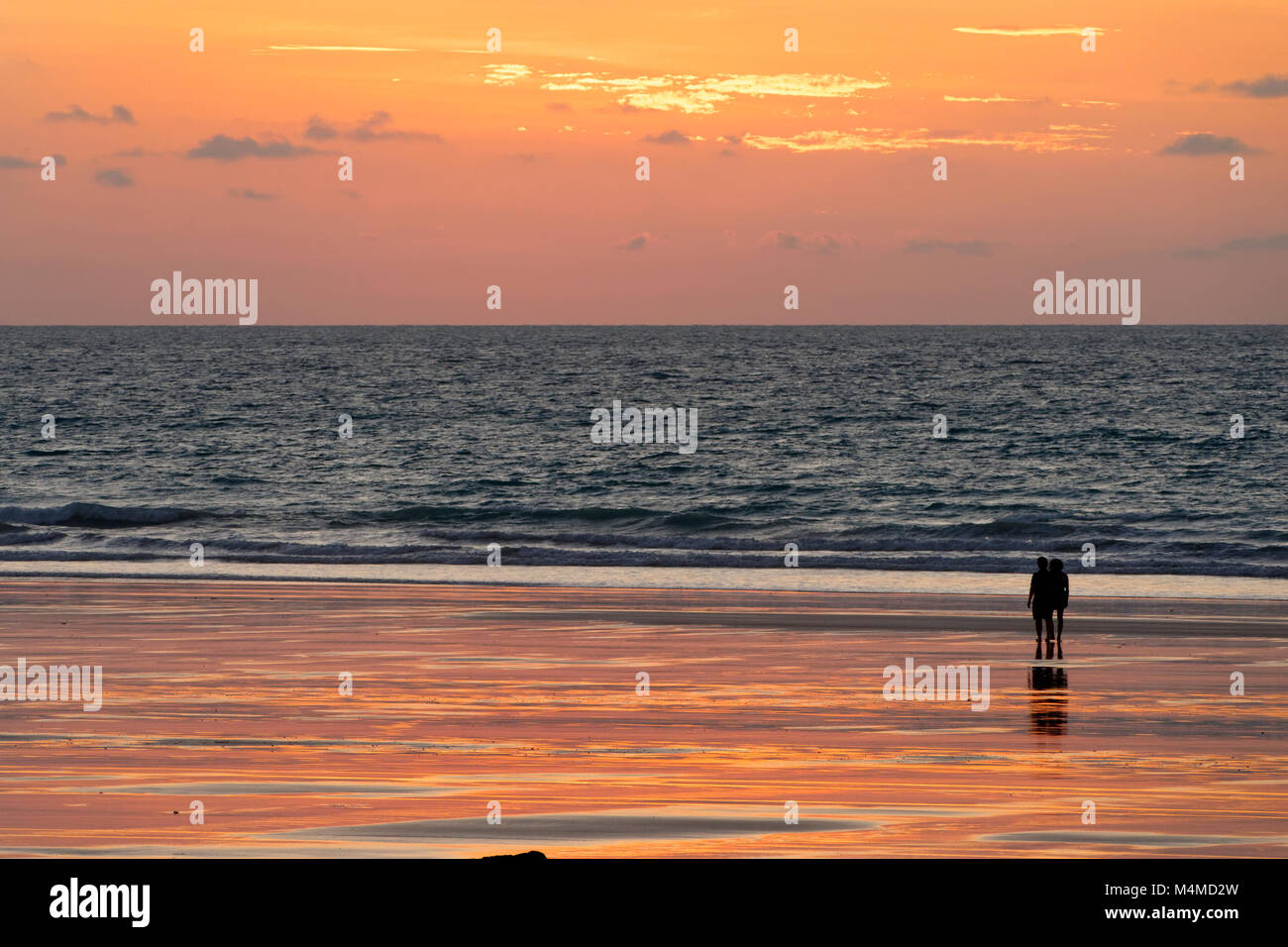 People on beach after sunset, Cable Beach, Broome, West Kimberley, Western Australia Stock Photo