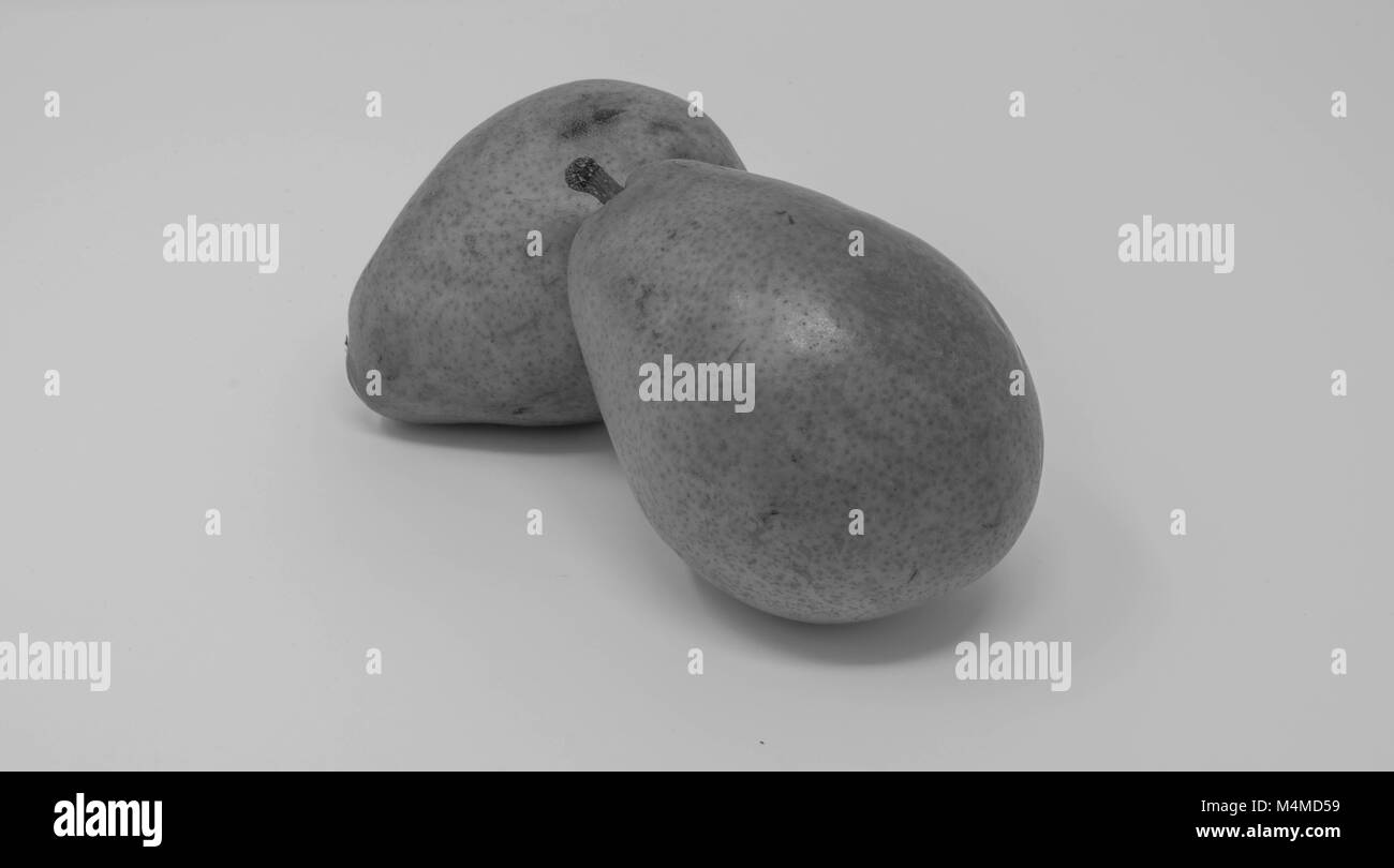 Studio shot of two isolated pears, in black and white Stock Photo