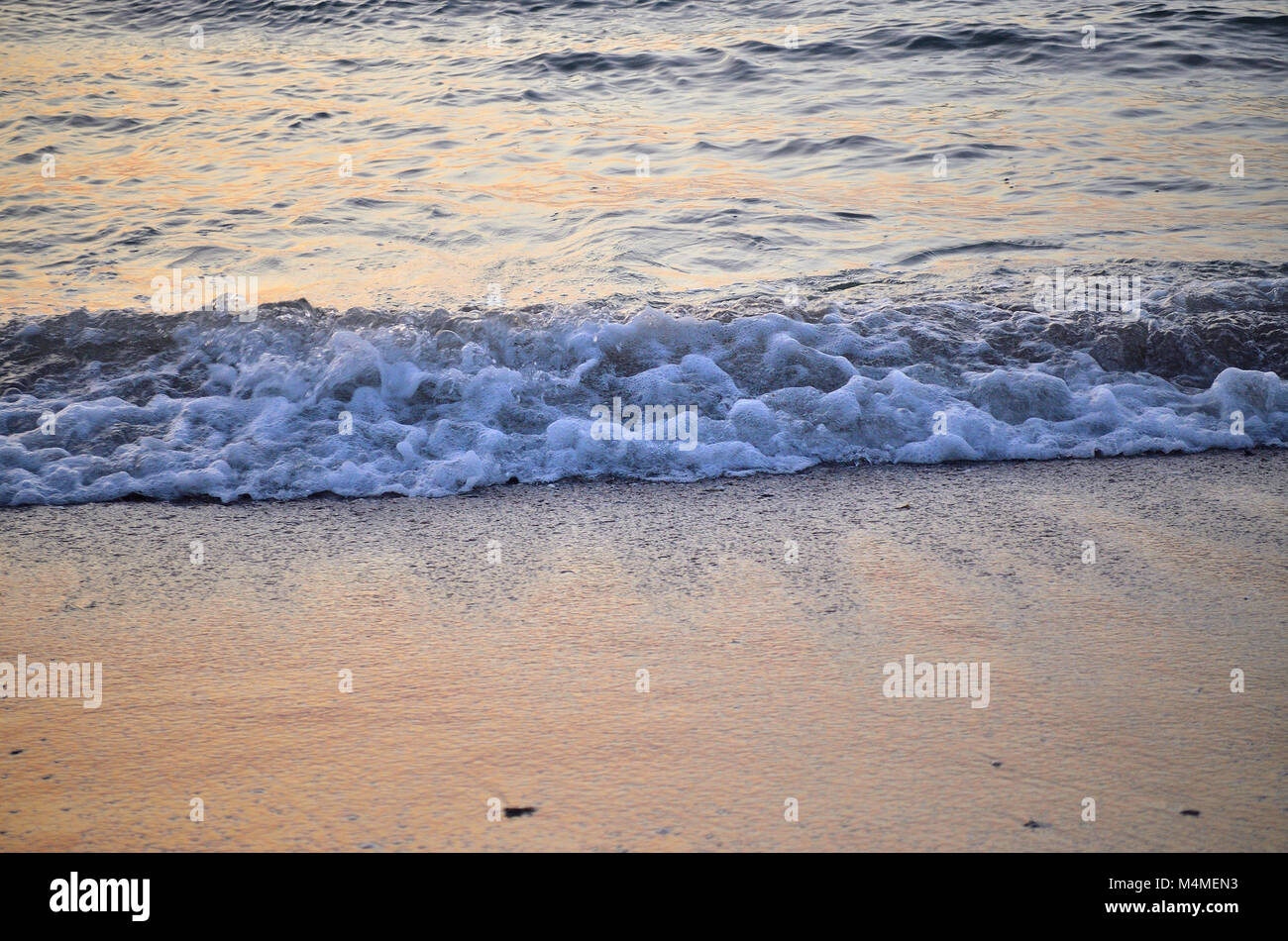Foamy waves on morning seascape Stock Photo Alamy