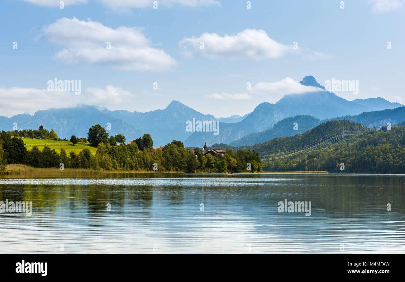 Green water Weissensee lake in Alps Mountains Stock Photo