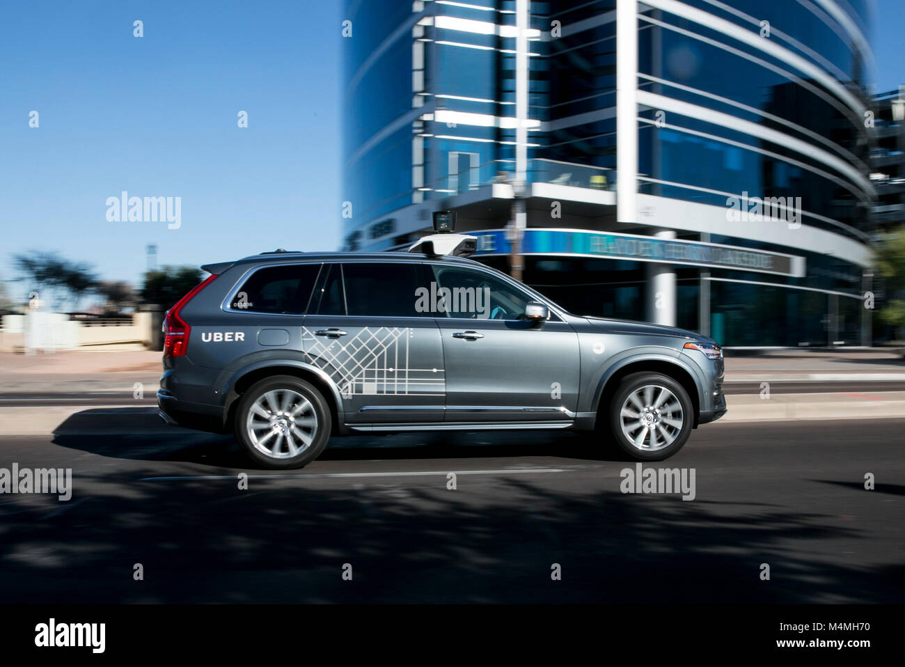 An Uber self-driving autonomous vehicle seen driving in Tempe, Arizona on February 3, 2018. Stock Photo