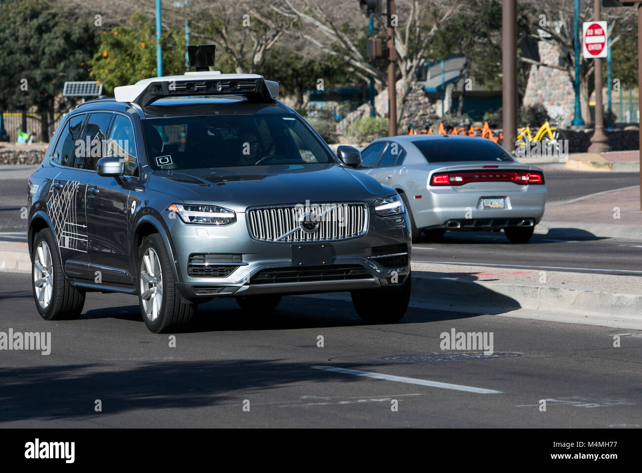 An Uber self-driving autonomous vehicle seen driving in Tempe, Arizona on February 3, 2018. Stock Photo