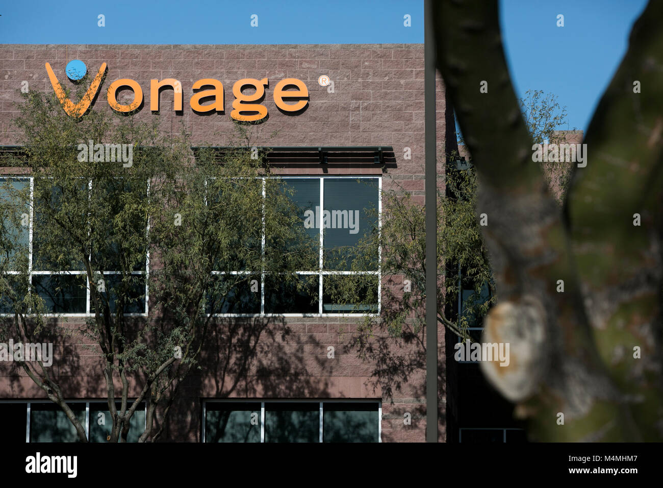 A logo sign outside of a facility occupied by Vonage Holdings Corp., in Scottsdale, Arizona, on