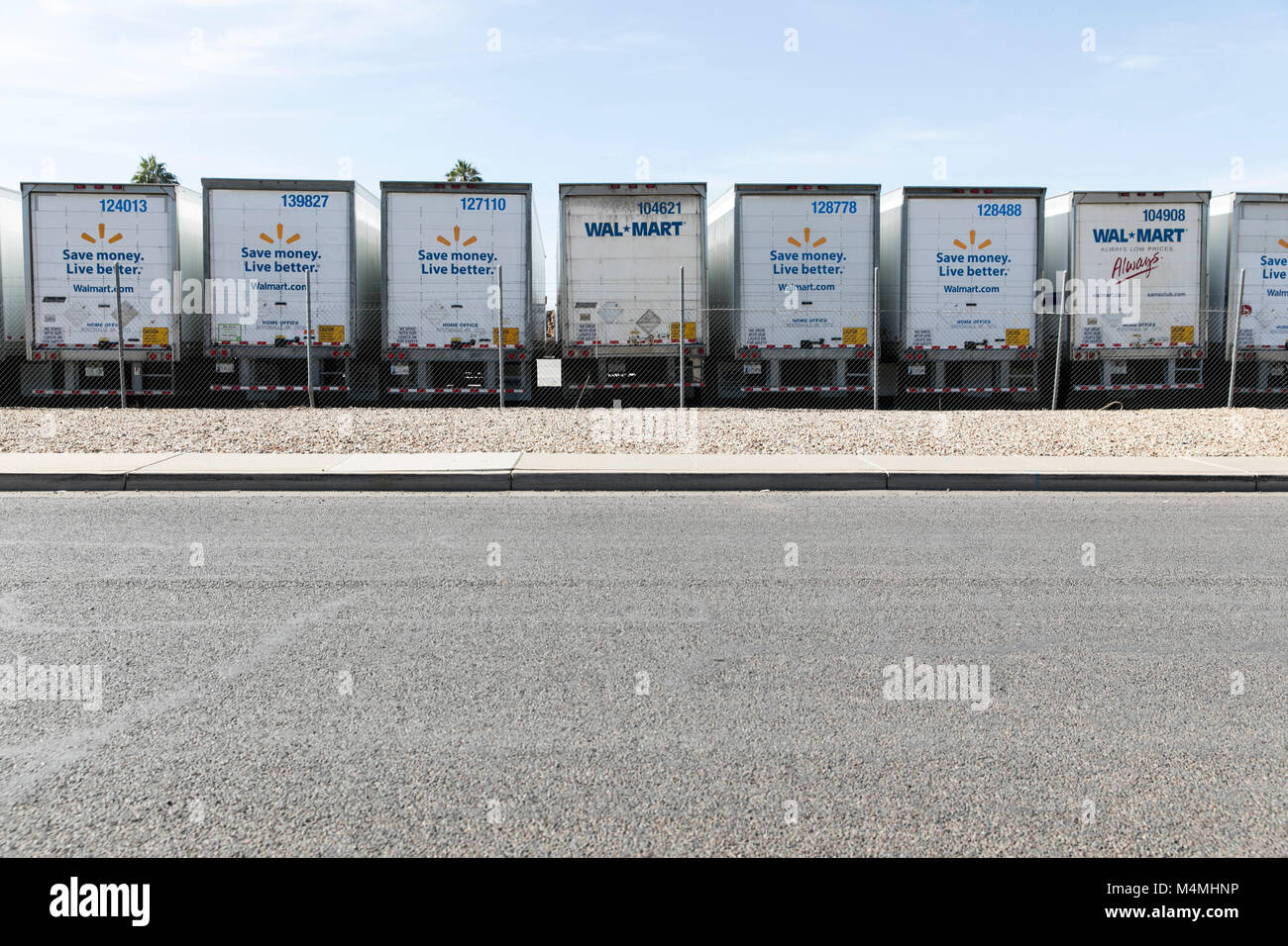 Walmart Inc., logos on a row of semi-truck trailers in Phoenix, Arizona, on February 4, 2018. Stock Photo