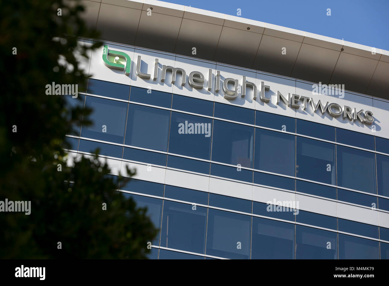 A logo sign outside of the headquarters of Limelight Networks in Tempe, Arizona, on February 3, 2018. Stock Photo