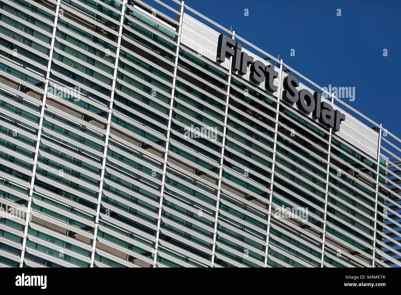 A logo sign outside of the headquarters of First Solar, Inc., in Tempe