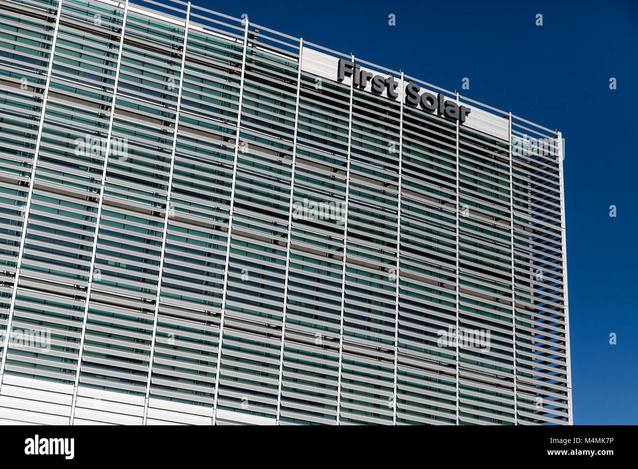 A logo sign outside of the headquarters of First Solar, Inc., in Tempe