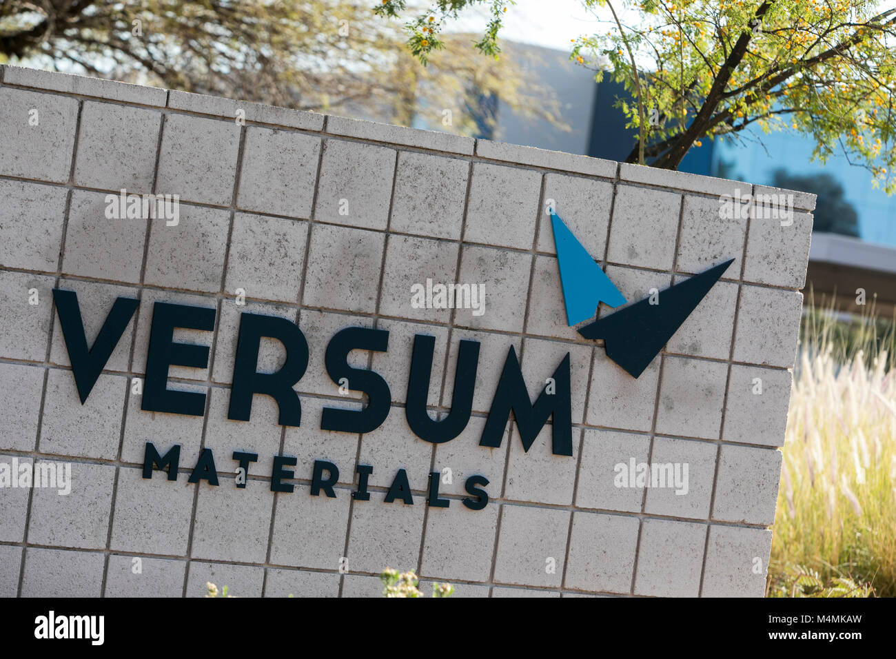 A logo sign outside of a the headquarters of Versum Materials in Tempe