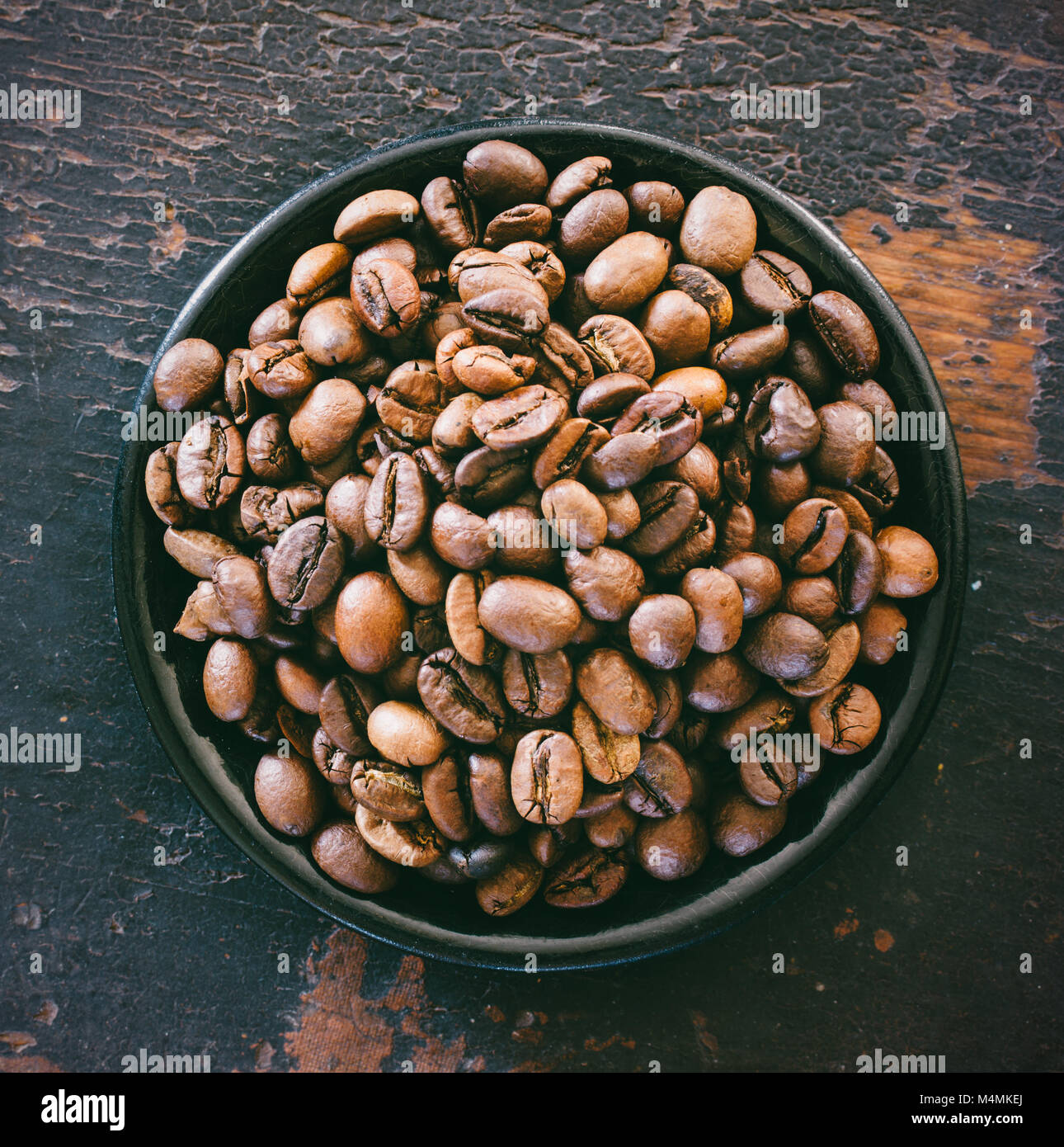 roasted coffee beans on grunge background, top view closeup Stock Photo ...