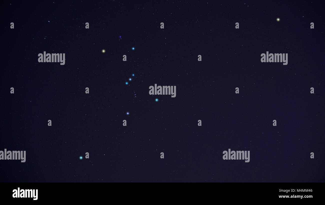 Orion Constellation in winter night sky including bright stars Betelgeuse (left arm), Bellatrix (right arm), Meissa (head), three-star Orion Belt belo Stock Photo