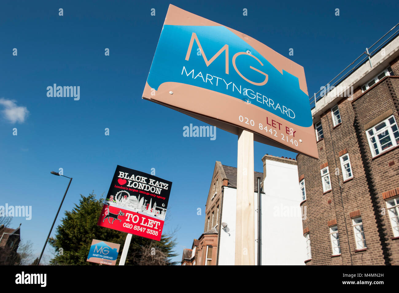 Estate agent signs in Muswell Hill, London Stock Photo