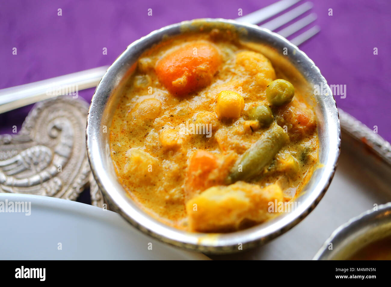 Macro photo of delicious Indian vegetable dishes with curry in a restaurant Stock Photo