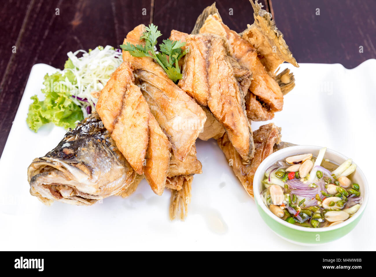 Sea bass fried Stock Photo Alamy