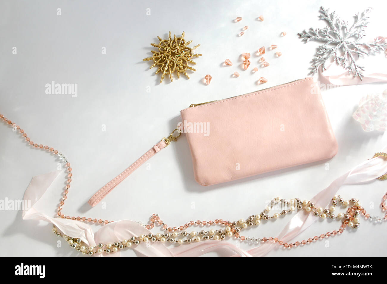 pink-fashion-purse-with-winter-decorations-stock-photo-alamy