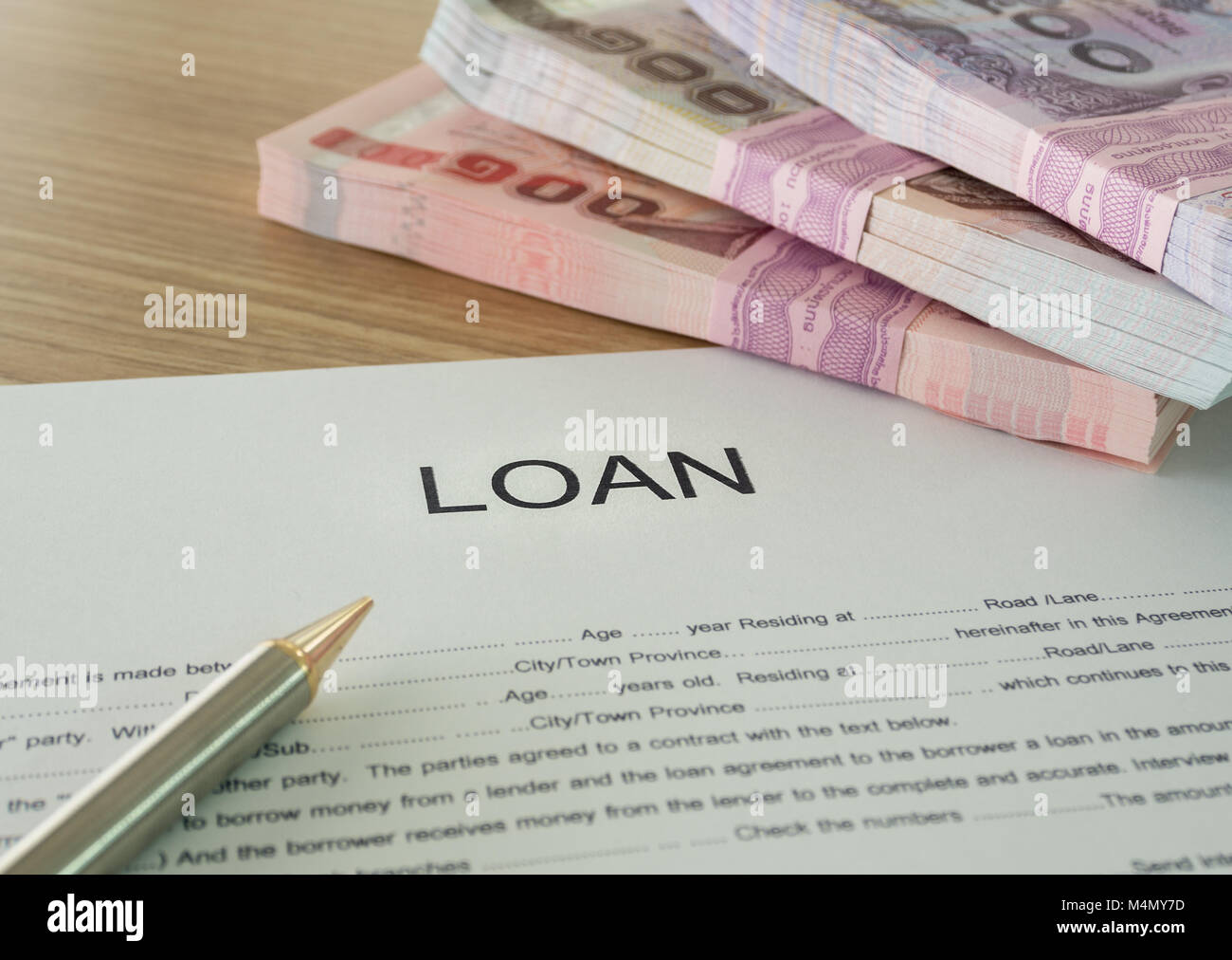 The loan documents and banknotes on desk's bankers Stock Photo Alamy