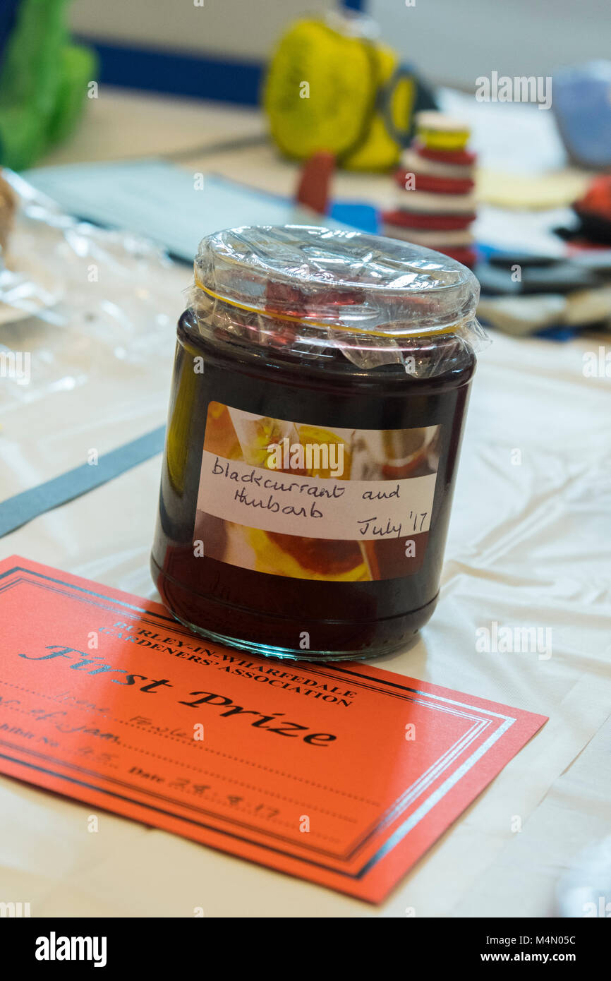 Close-up of 1st prize winning jar of fruit jam & certificate - competition entry at Gardeners' Show, Burley-in-Wharfedale, West Yorkshire, England, UK Stock Photo