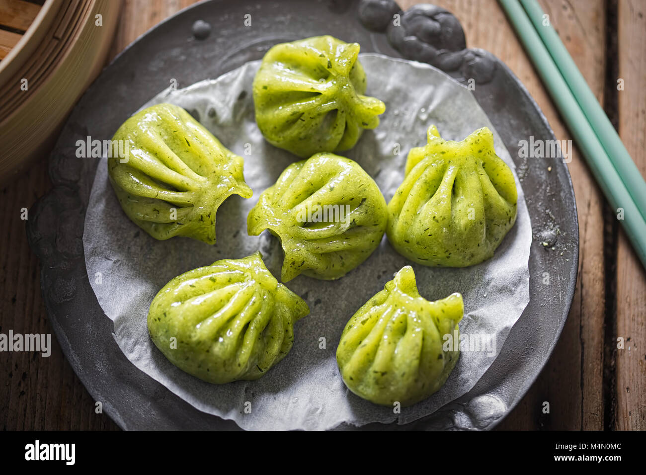 Steamed edamame dim sum. Sticky spinach & rice dumplings, filled with