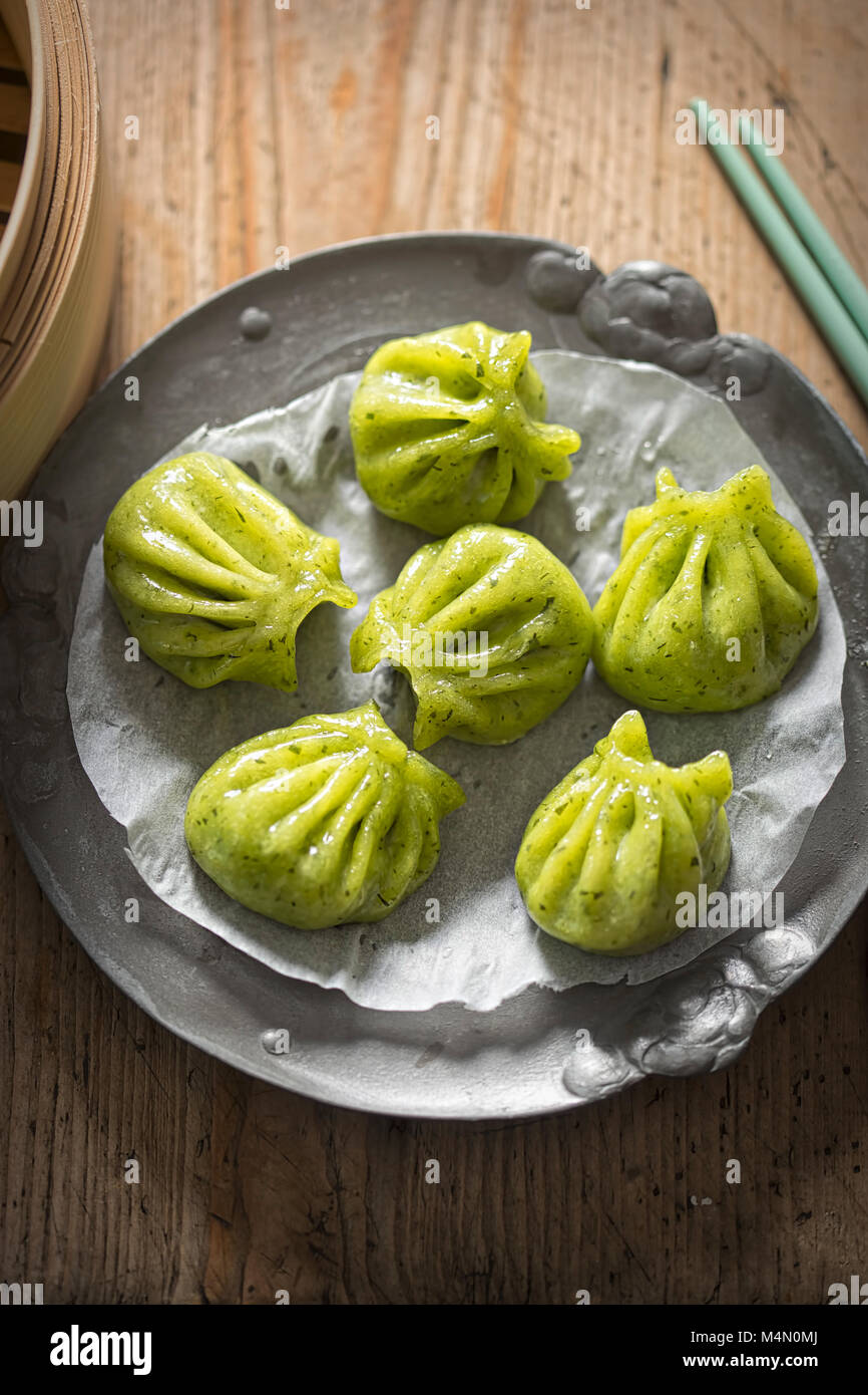 Steamed edamame dim sum. Sticky spinach & rice dumplings, filled with