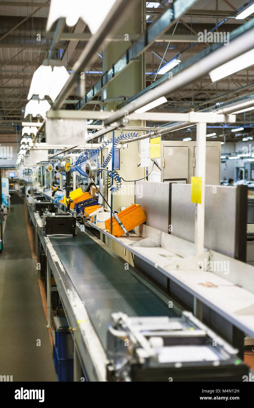 conveyor belt of assembly line for office equipment in factory Stock ...