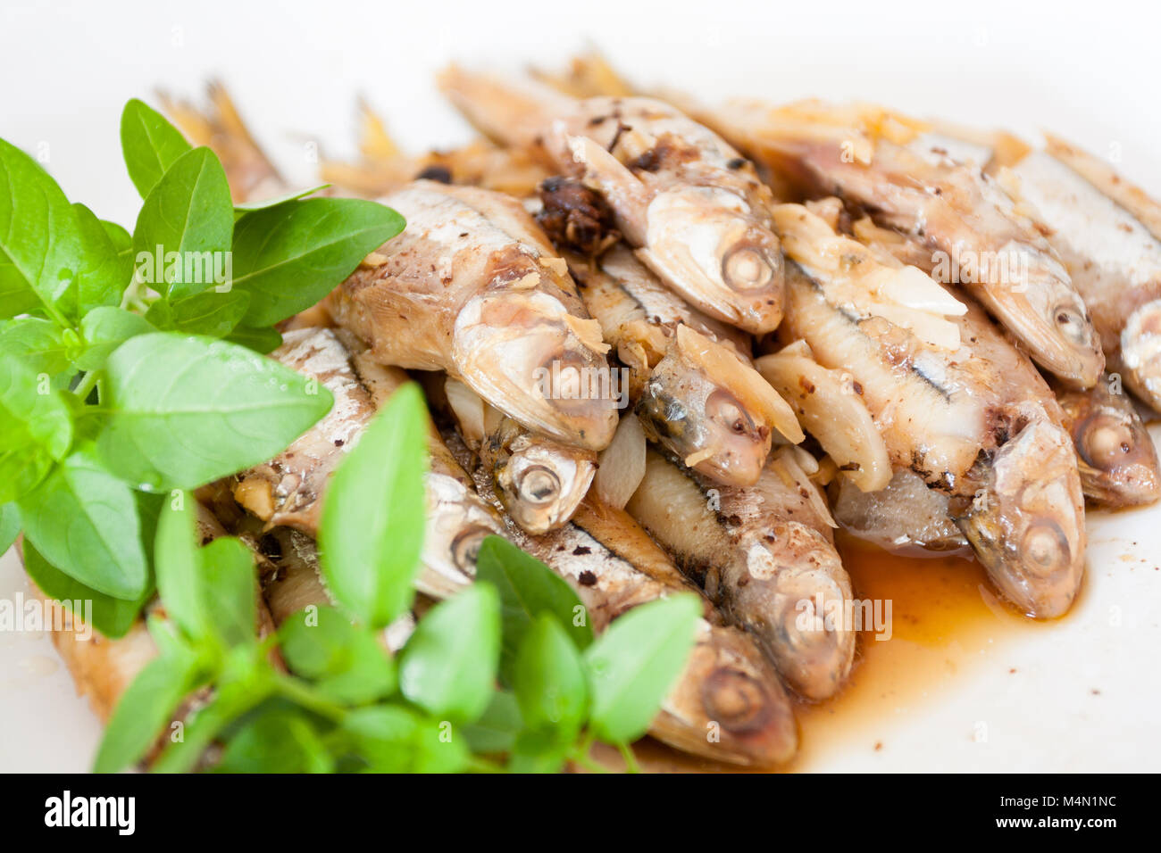 Manjuba (in Portuguese), Broadband anchovy (Anchoviella lepidentostole) simmered with sugar, salt, ginger, soy sauce, rice wine, basil Stock Photo