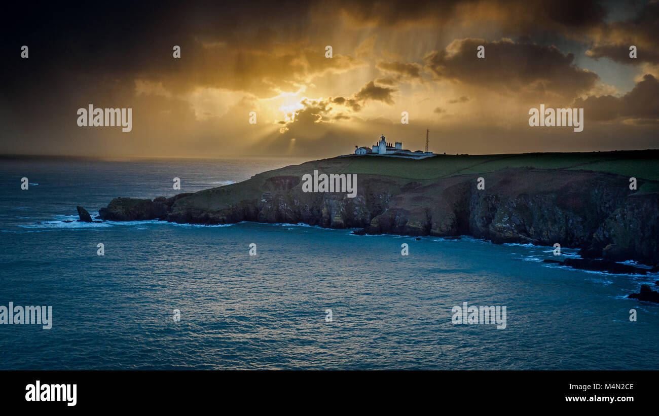Lizard Lighthouse at sunset Lizard Peninsula Cornwall The distinctive twin towers mark the most southerly point of mainland Britain Stock Photo