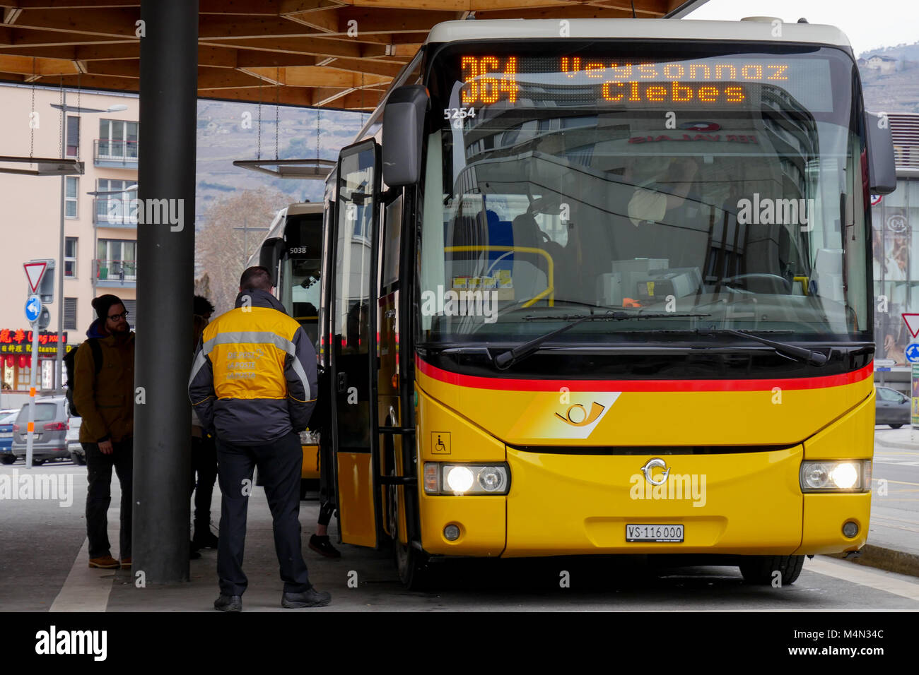 Swiss Post bus at Sion railway station bus stop, Valais district, Swiss