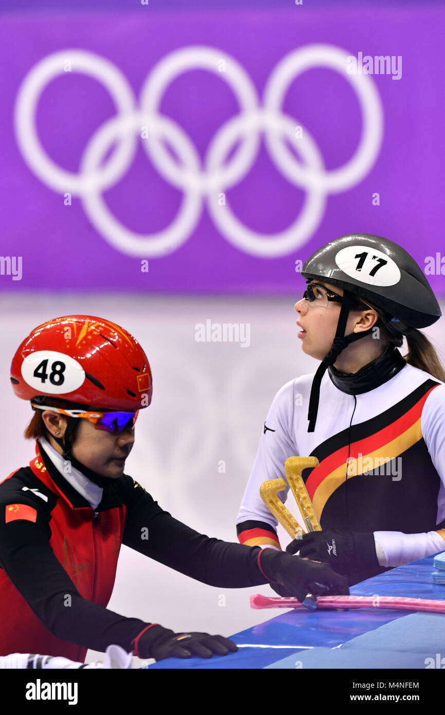 Gangneung, South Korea. 17th Feb, 2018. Yutong Hanb from China (L) and Anna Seidel from Germany after the women's 1500m short track speed skating event of the 2018 Winter Olympics in the Gangneung Ice Arena in Gangneung, South Korea, 17 February 2018. Credit: Peter Kneffel/dpa/Alamy Live News Stock Photo