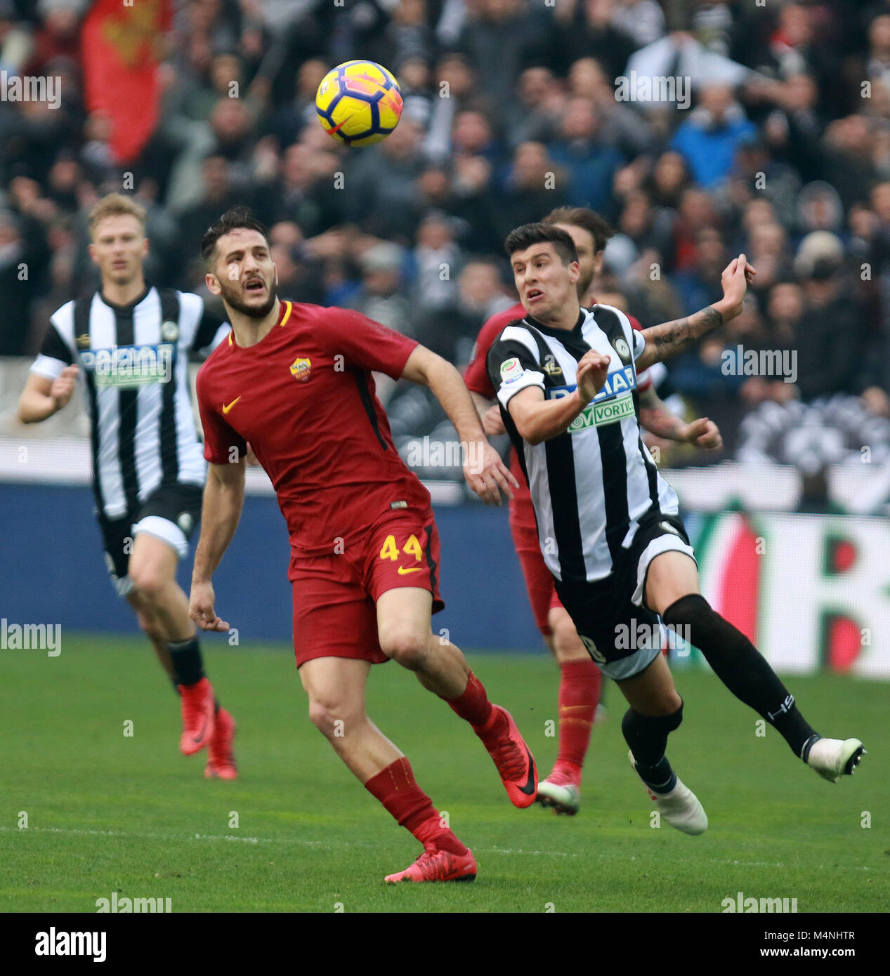 Udine, Italy. 17th Feb, 2018. Roma's defender Kostas Manolas (L) vies with Udinese's forward Stipe Perica (R) during the Serie A football match between Udinese Calcio v AS Roma at Dacia Arena Stadium on 17th February, 2018. Credit: Andrea Spinelli/Alamy Live News Stock Photo