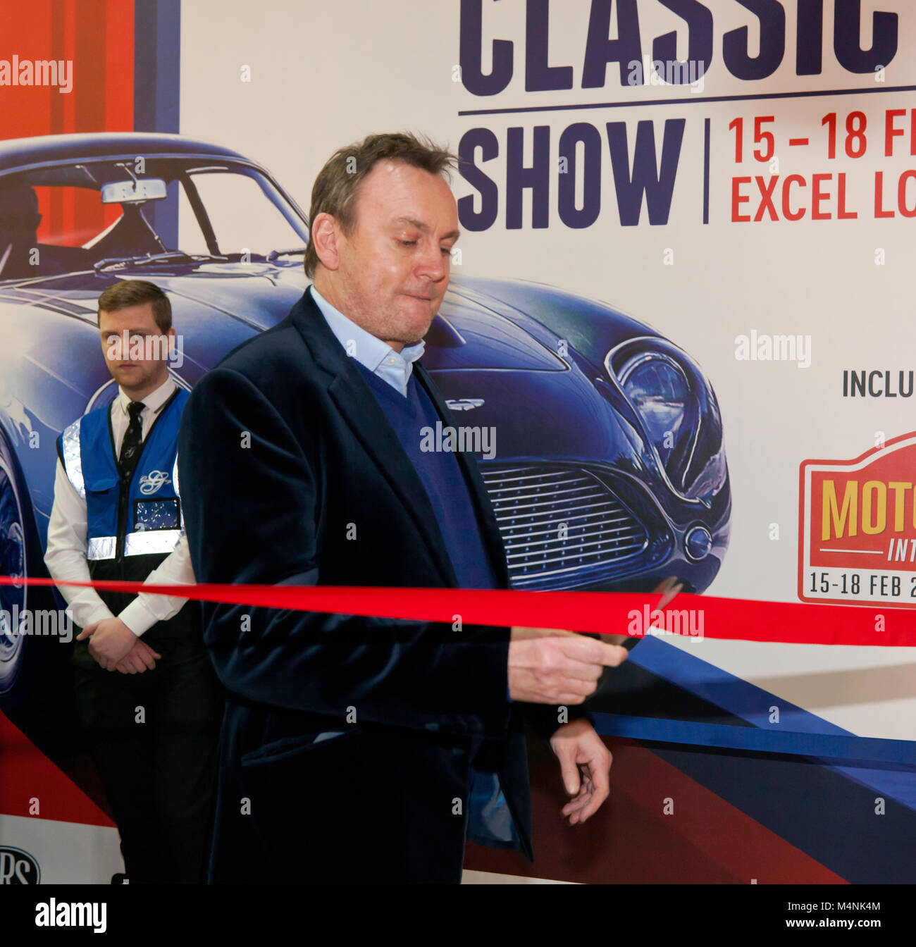Actor, Philip Glenister cutting a ribbon to open  "The London Classic Car Show",   on Saturday morning,  17th February 2018, at ExCel Lobndon. Stock Photo