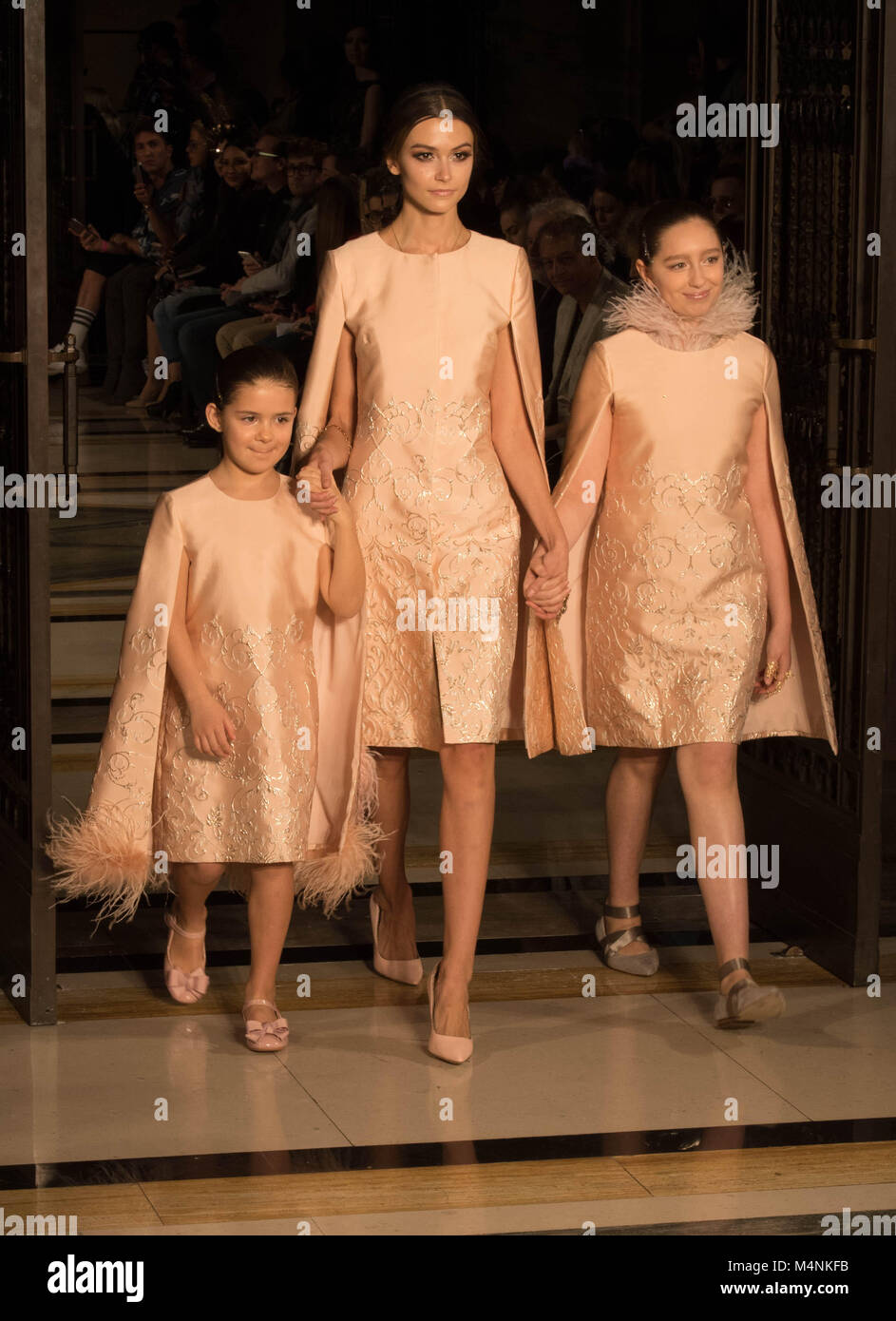 London Fashion Week, The catwalk show of OLGA ROH, A SWISS based S FASHION DESIGNER, who punctuated her show with classic dancers in a stunning presentation Pictured two child models and an adult model in matching outfits.  Credit Ian Davidson/Alamy Live News Stock Photo