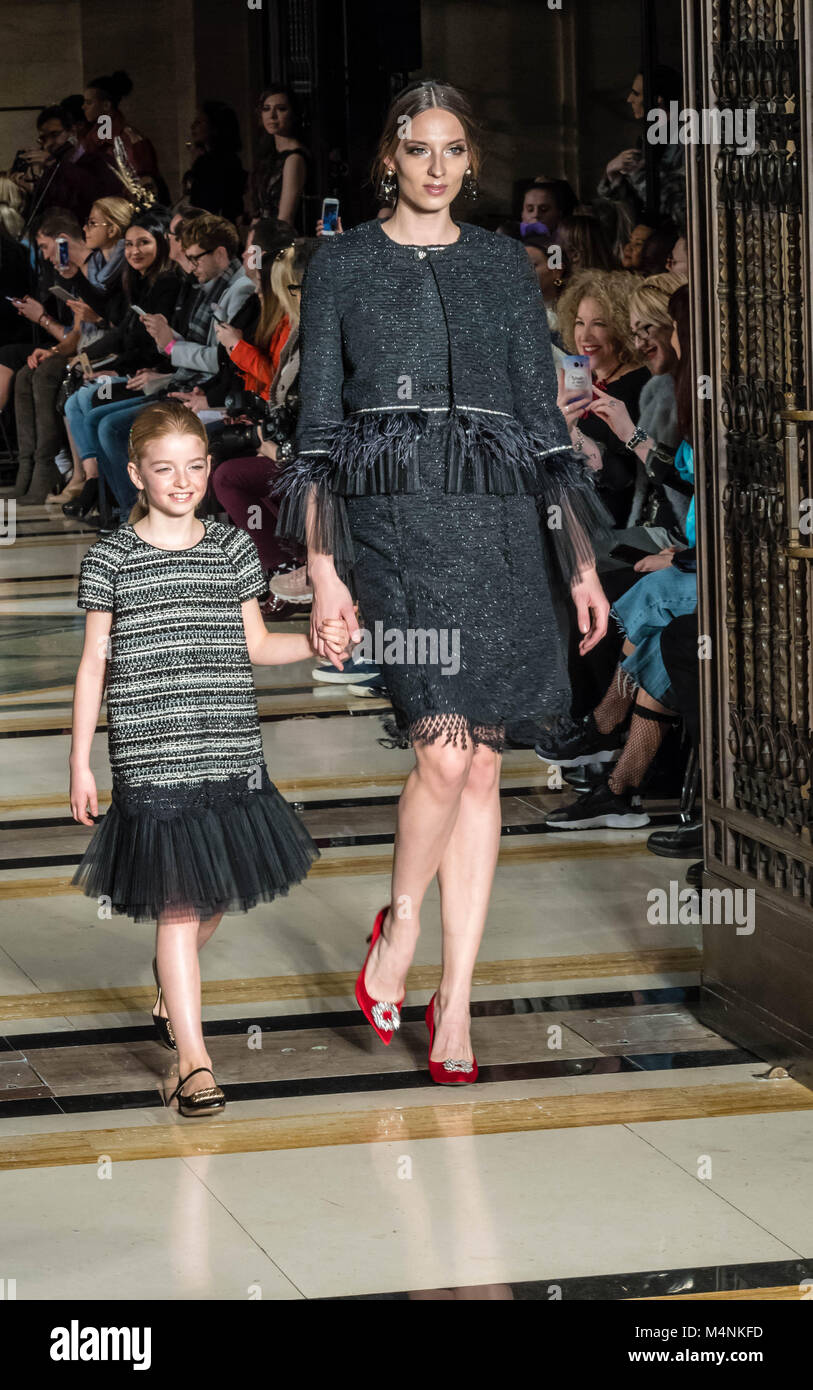 . London Fashion Week, Fashion Scout The catwalk show of OLGA ROH, A SWISS FASHION DESIGNER, who punctuated her show with classic dancers in a stunning presentation. Pictured a child model with an adult model  Credit Ian Davidson/Alamy Live News Stock Photo