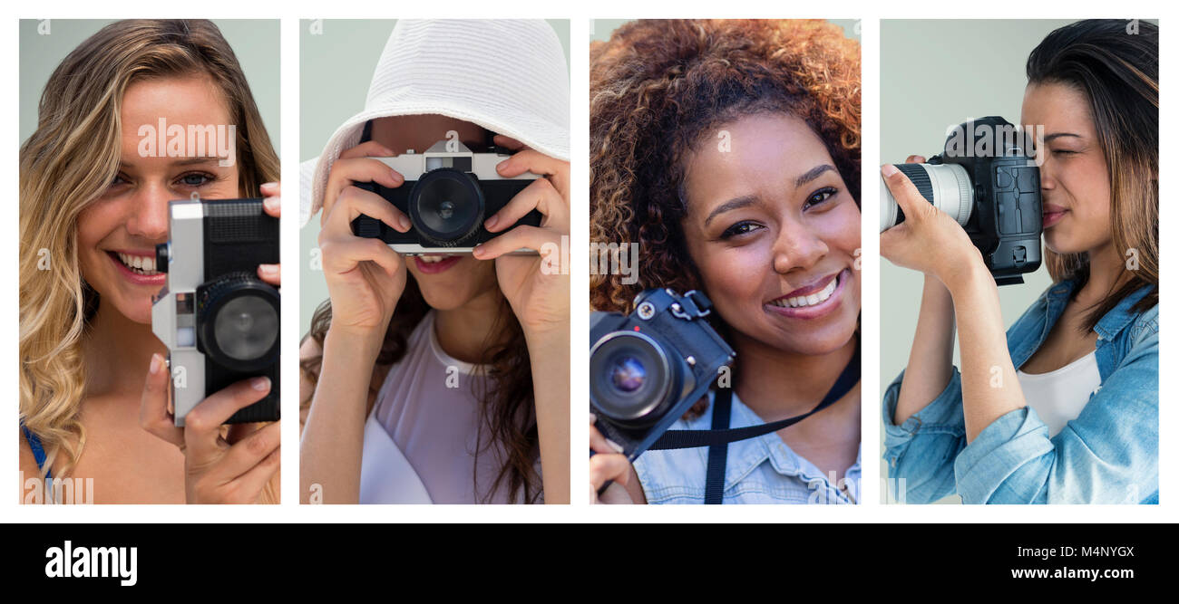 Smiling woman taking picture Stock Photo
