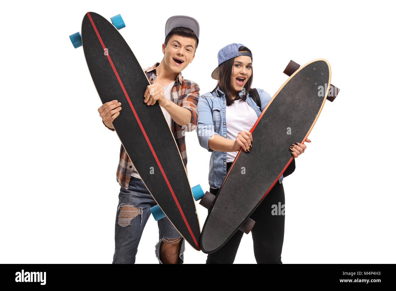 Joyful teenagers with longboards isolated on white background Stock Photo