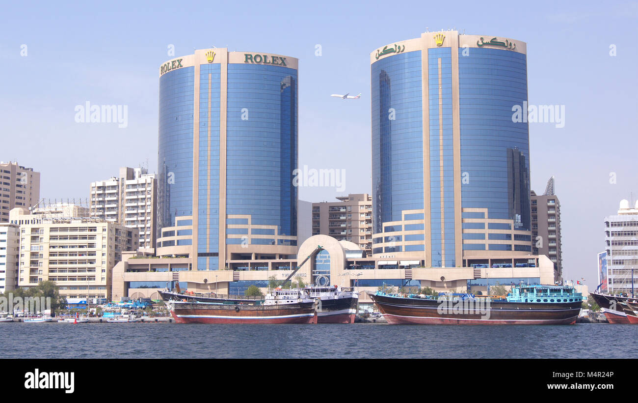 DUBAI, UNITED ARAB EMIRATES - MARCH 30th, 2014: The Twin Towers of Dubai Creek in Dubai, UAE. Also known as Rolex Towers, each building is 102 metres 335 ft in height and has 22 floors Stock Photo