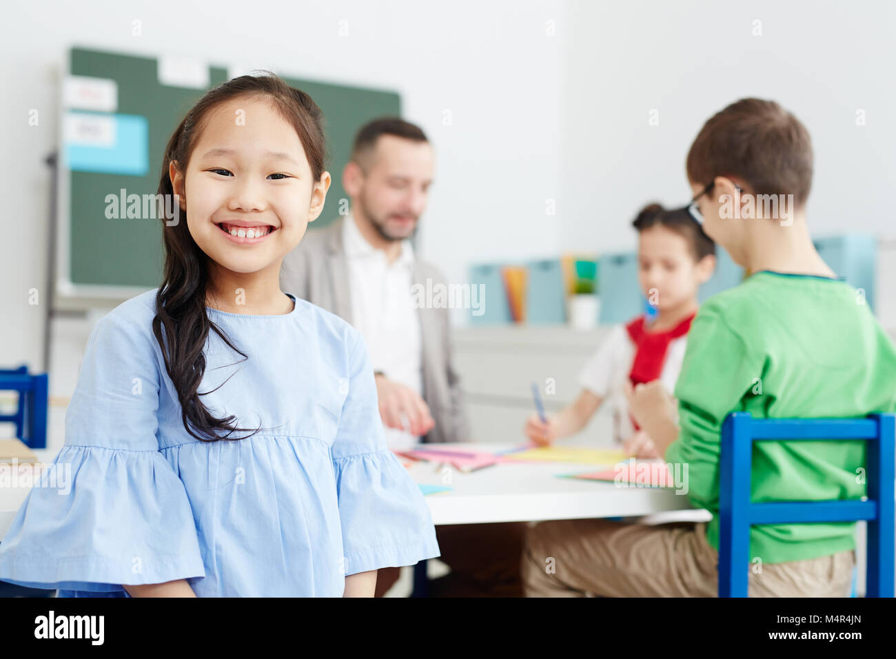 Asian teacher student child man hi-res stock photography and images - Alamy