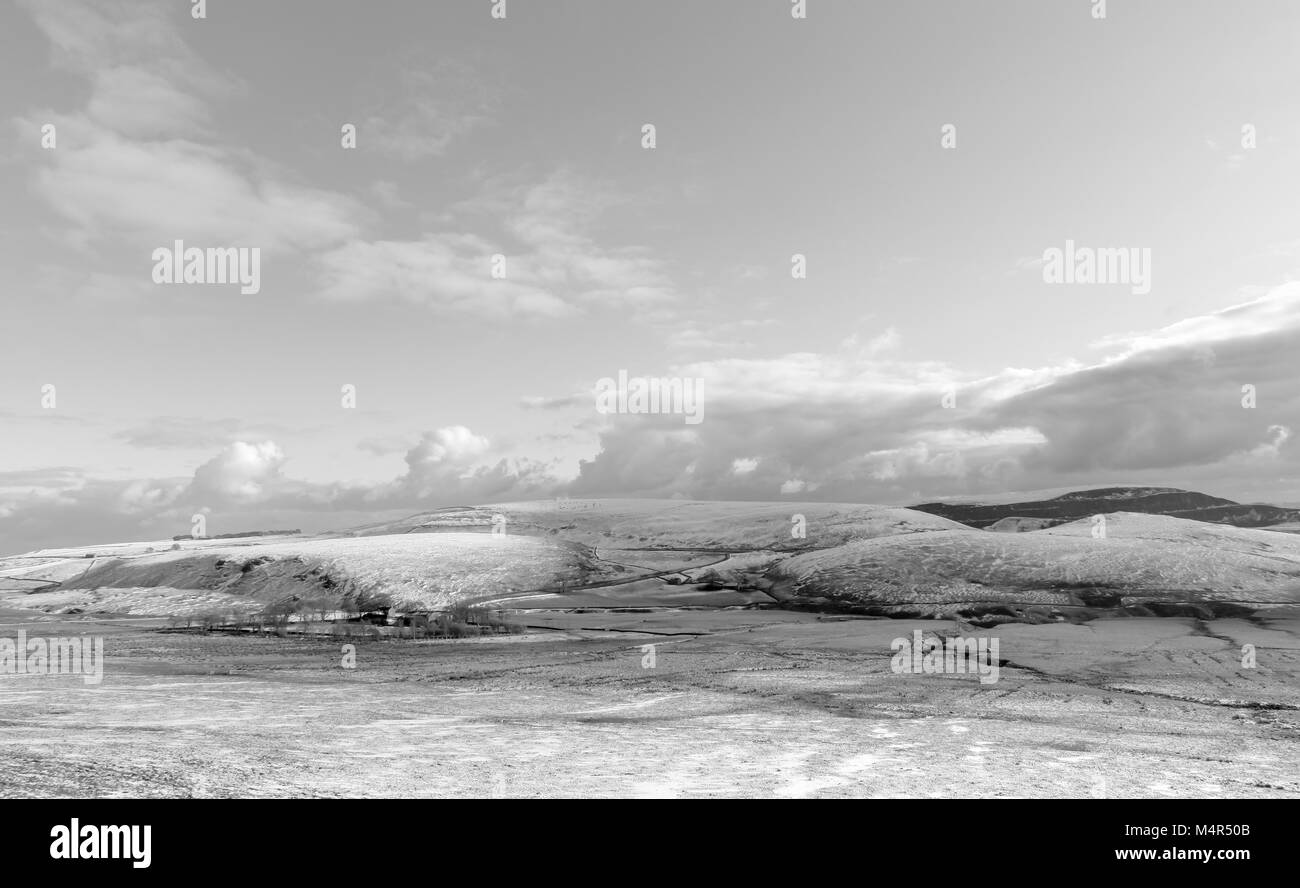 black and white images of snow on hills in  Peak District National Park,England Stock Photo