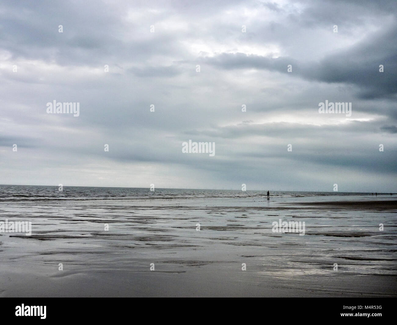 solitary person in the sea at Mablethorpe,Lincolnshire,England Stock Photo